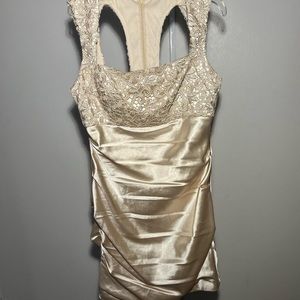 Gold mini/ midi dress.